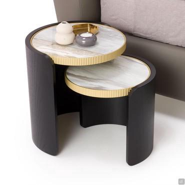 Stackable side tables Roller in stoneware and curved black stained ash wood. Top edged in gold metal